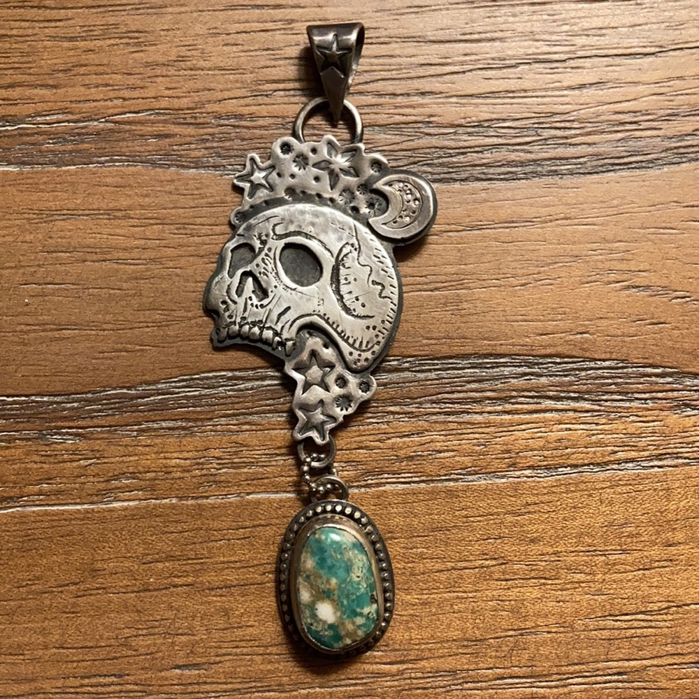 Sterling Silver skull pendant with turquoise stone